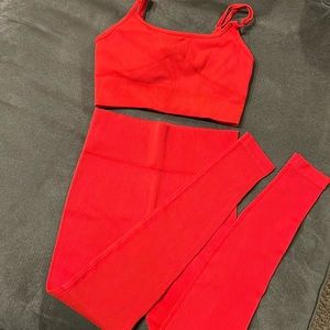 Two piece athletic red bralette and leggings